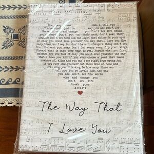 New, never opened canvas framed music lyrics to “The Way That I Love You”